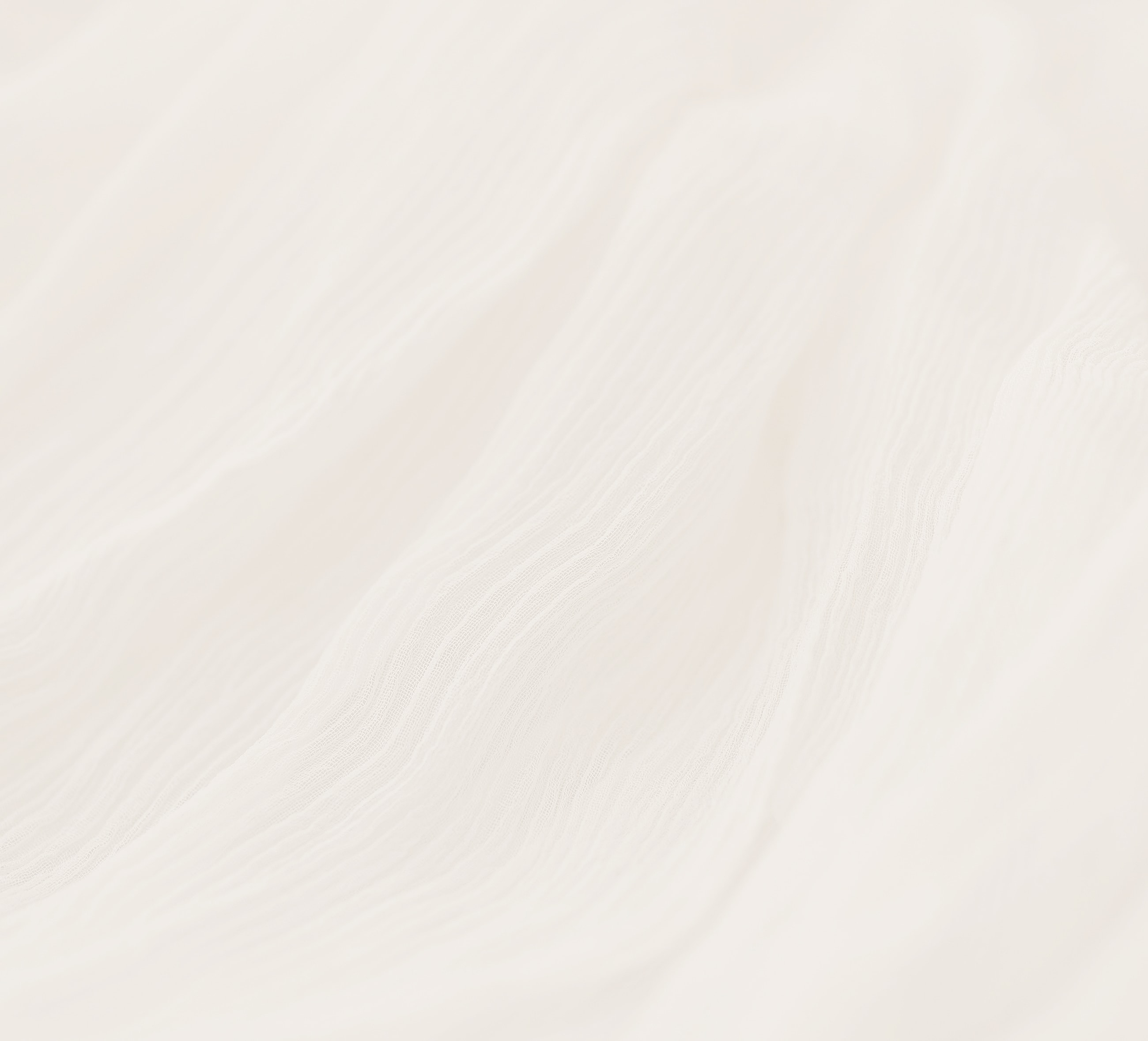 Soft white fabric with delicate ripples